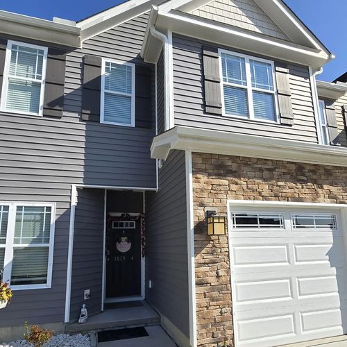 Front exterior of the furnished townhome in Greenville, North Carolina with attached garage