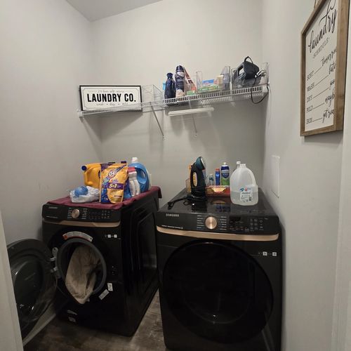 Laundry room with full-size washer and dryer